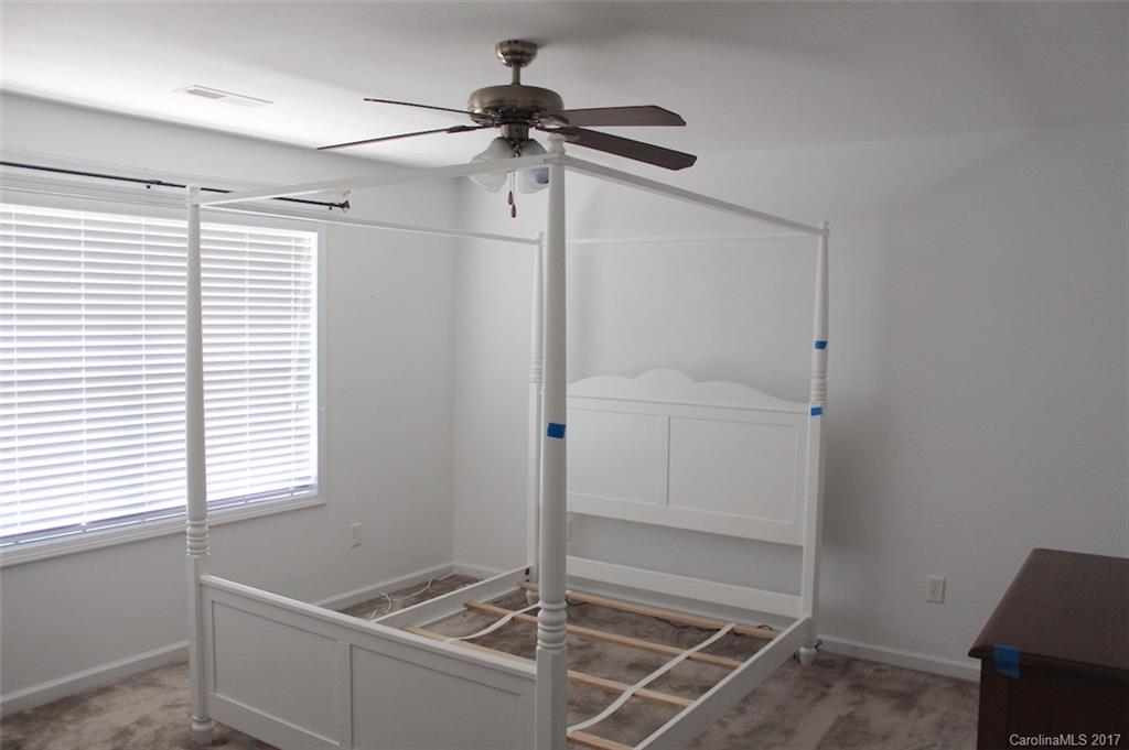 136 Scherer Drive Rutherfordton, NC 28139 - Photo 17 of 24 a bathroom with a window and a shower