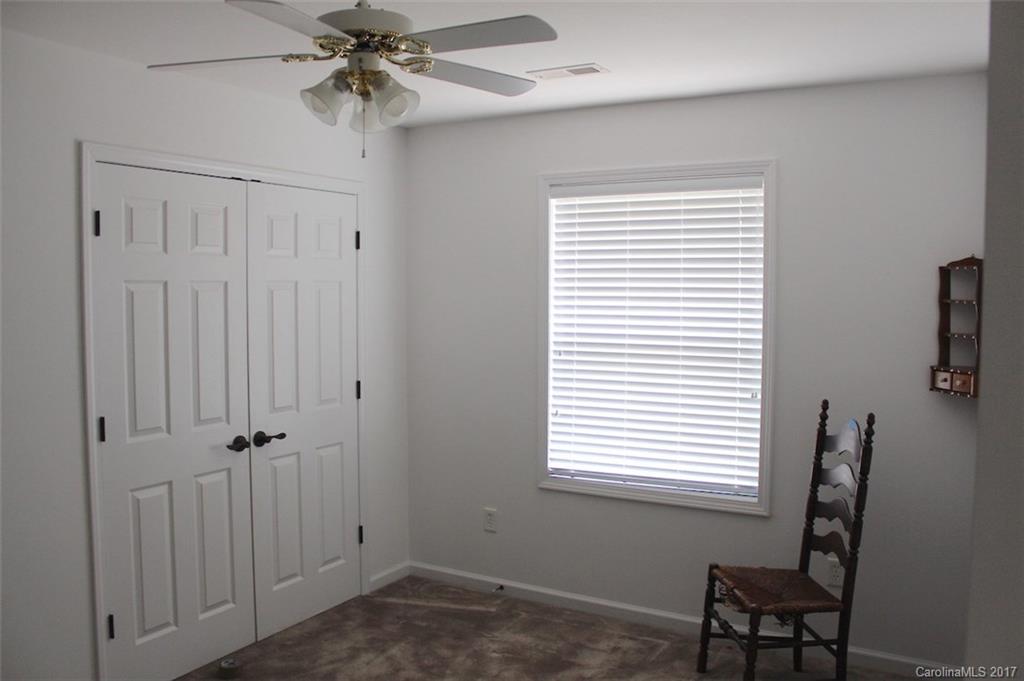 136 Scherer Drive Rutherfordton, NC 28139 - Photo 19 of 24 a view of a room with a window and a chandelier fan