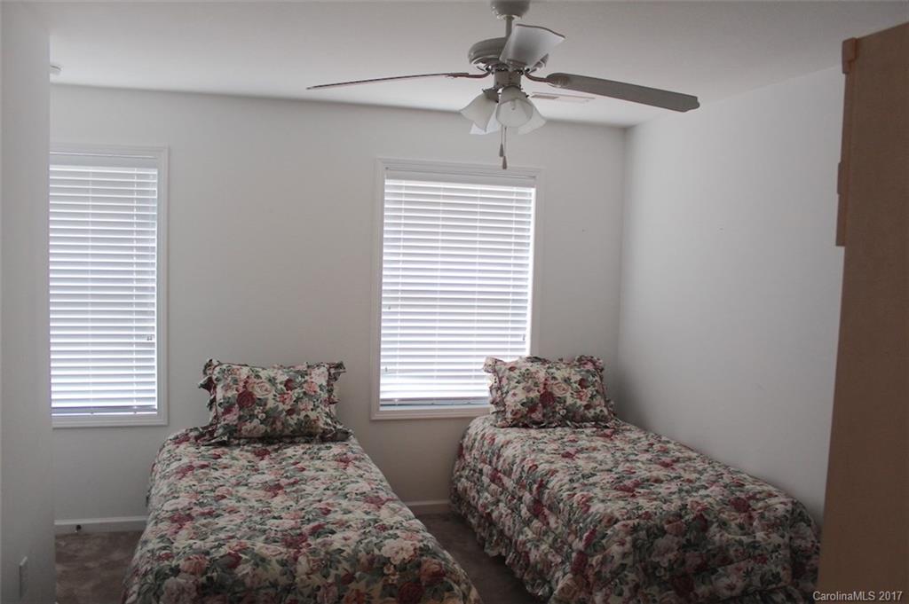 136 Scherer Drive Rutherfordton, NC 28139 - Photo 20 of 24 a bedroom with two bed and a window