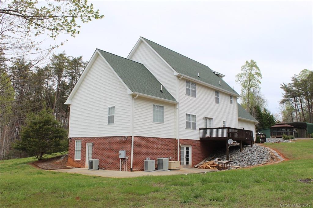 136 Scherer Drive Rutherfordton, NC 28139 - Photo 3 of 24 a view of a house with a yard and sitting area