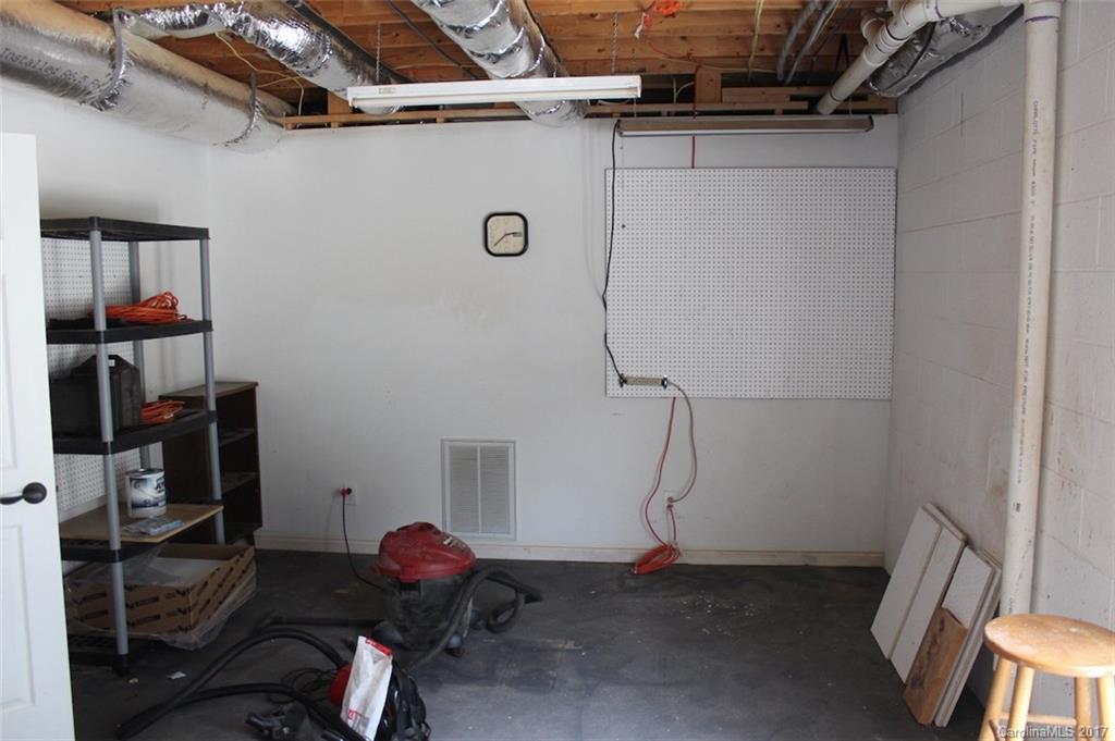 136 Scherer Drive Rutherfordton, NC 28139 - Photo 24 of 24 a room with water heater and storage