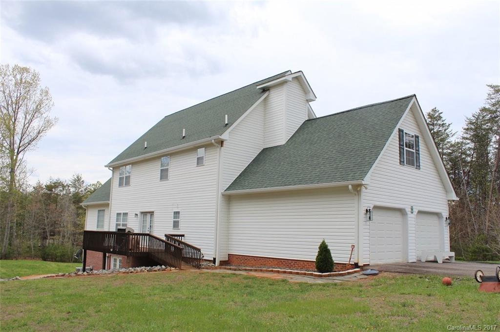 136 Scherer Drive Rutherfordton, NC 28139 - Photo 4 of 24 a view of a back yard of the house