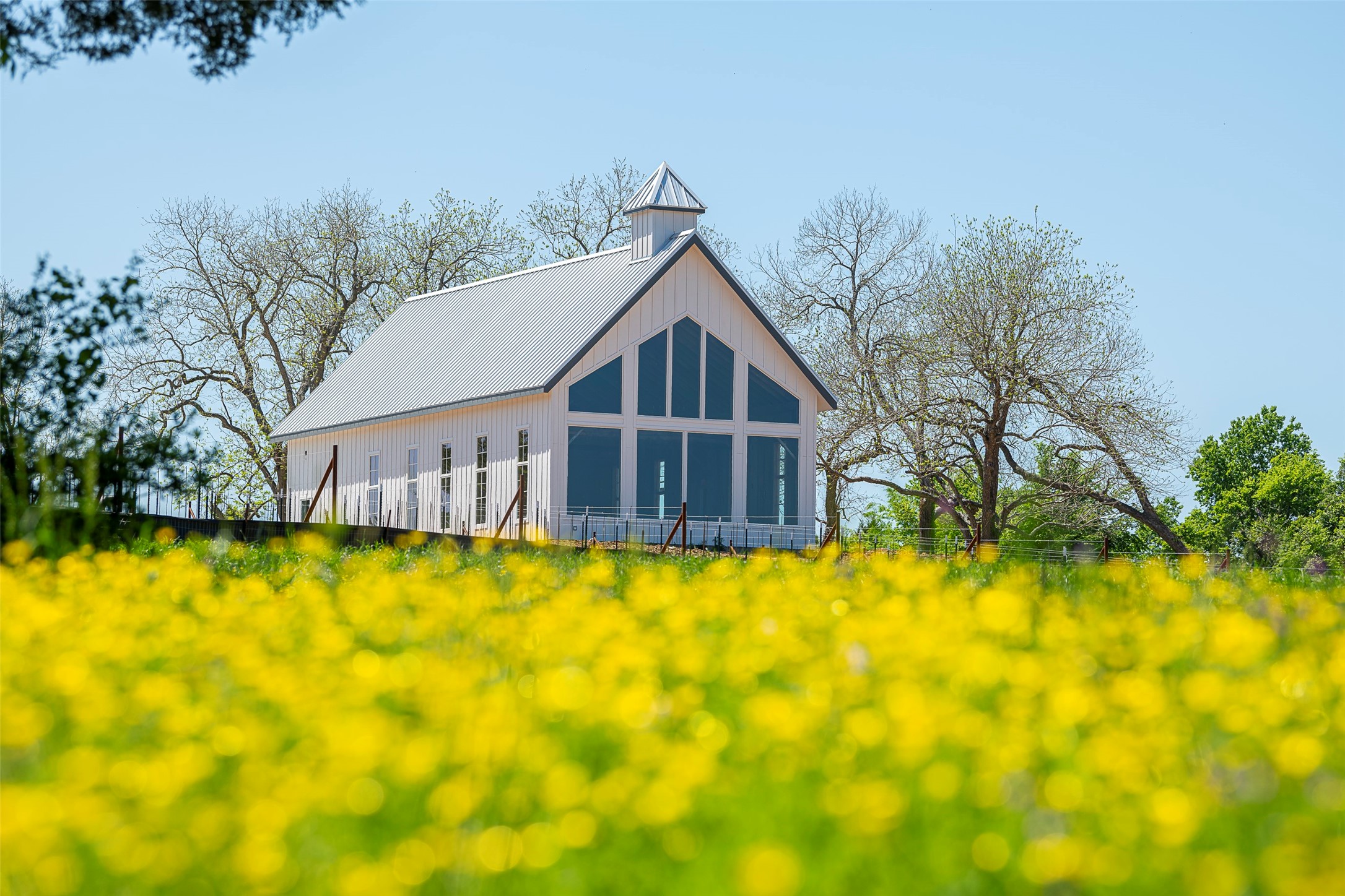 10026 Larkin Cove Willis, TX 77318 - Photo 42 of 44 Surrounded by natural beauty, the Chapel at Chambers Creek offers a tranquil space for worship, reflection, and meaningful gatherings—bringing neighbors together in a peaceful, picturesque setting.