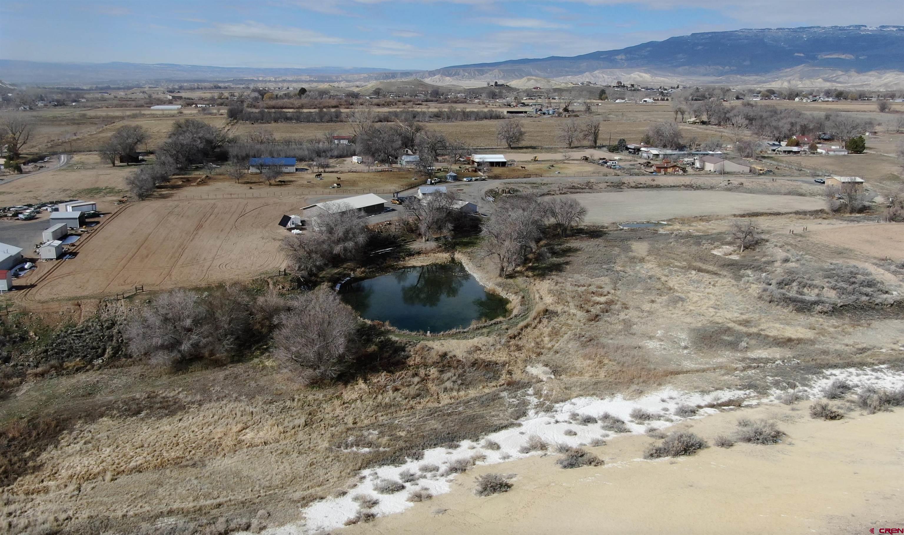 an aerial view of residential house and lake view