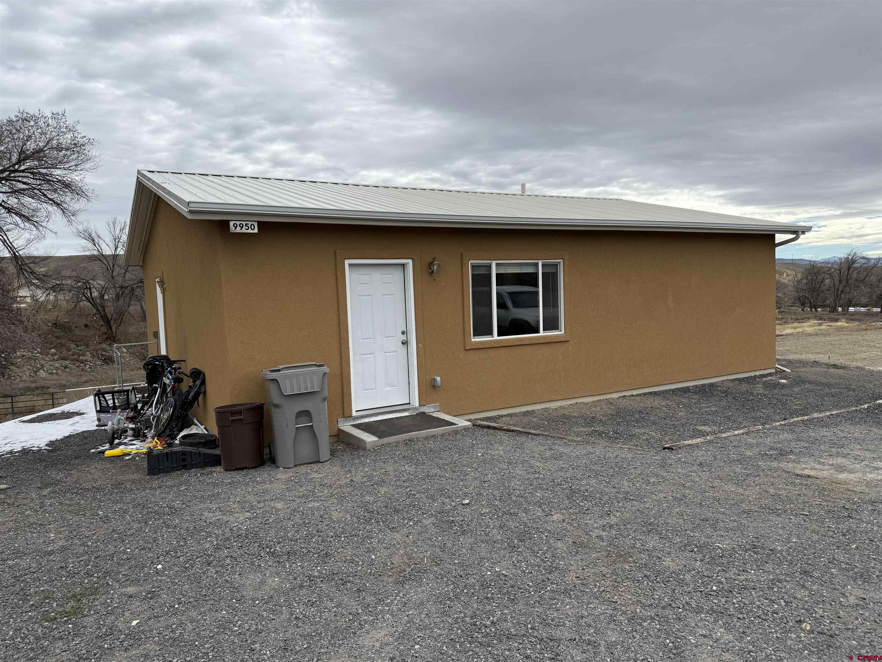 9940 2150th Road Austin, CO 81410 - Photo 35 of 44 a house with a outdoor space