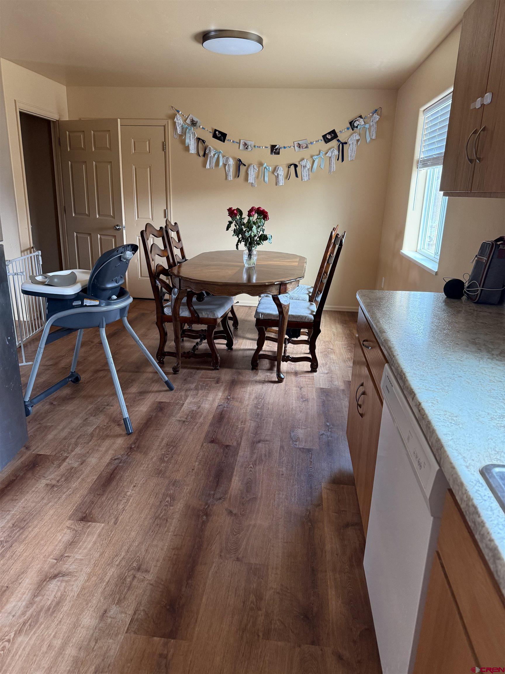 9940 2150th Road Austin, CO 81410 - Photo 44 of 44 a living room with furniture and a wooden floor