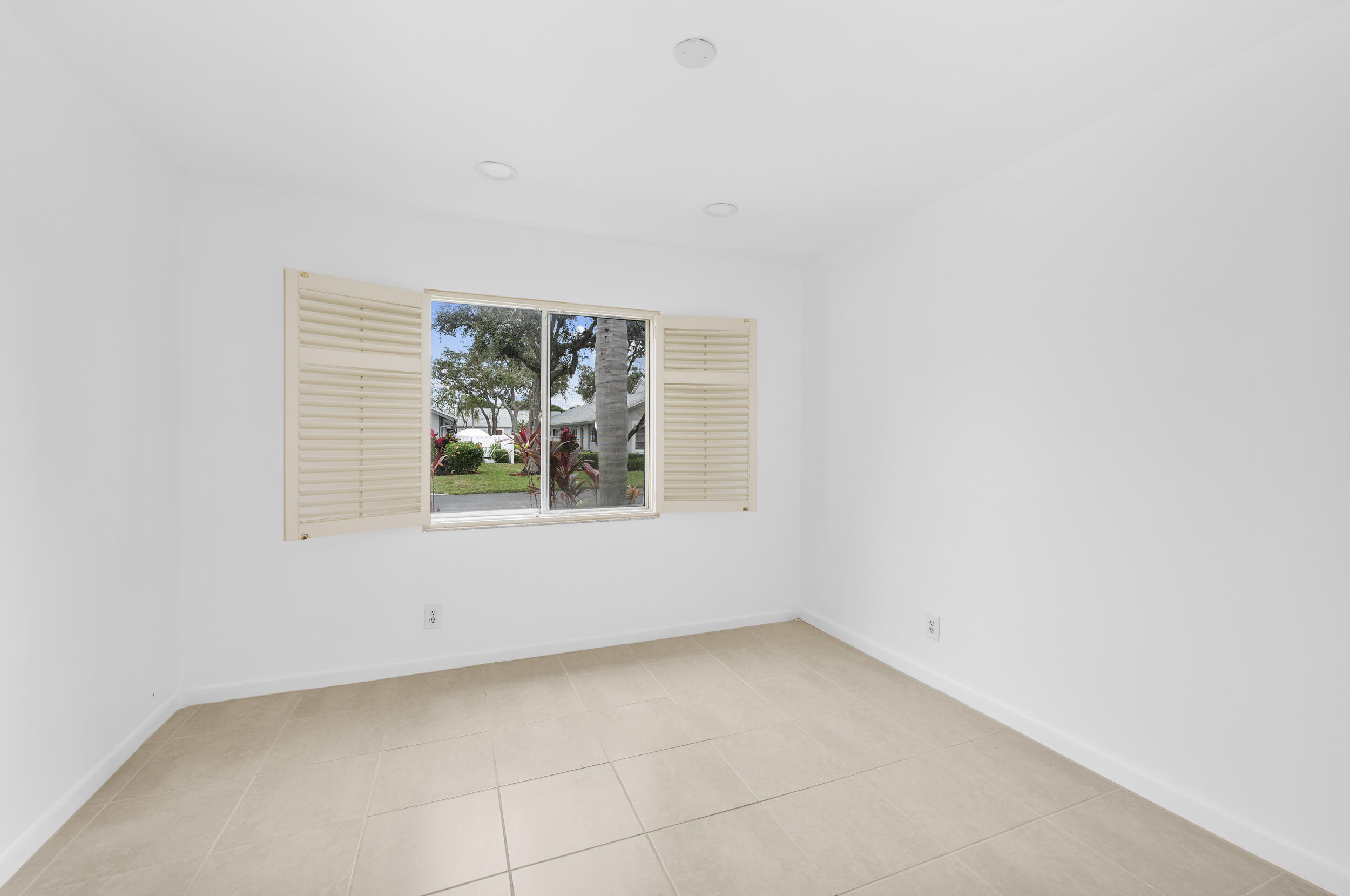 8888 Sunscape Lane Boca Raton, FL 33496 - Photo 13 of 35 an empty room with windows