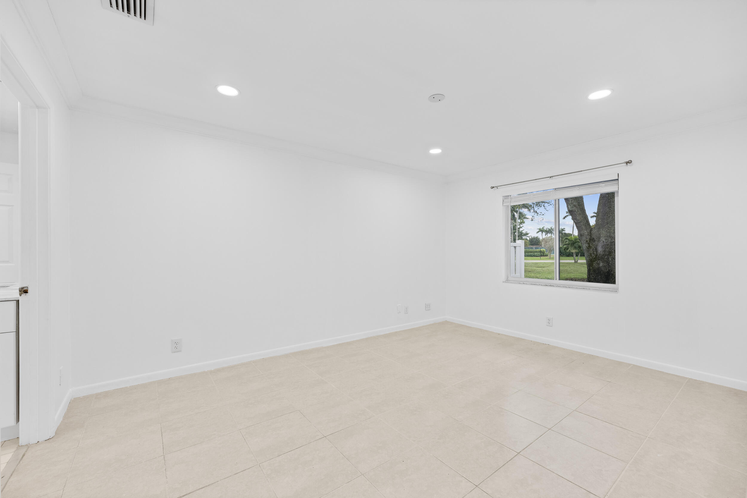 8888 Sunscape Lane Boca Raton, FL 33496 - Photo 16 of 35 an empty room with windows