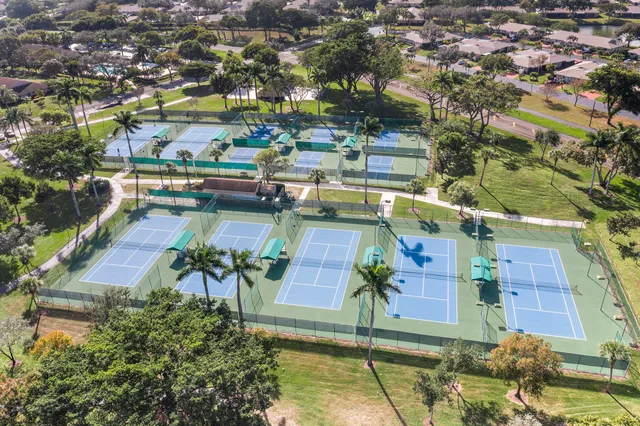 an aerial view of a house with a garden