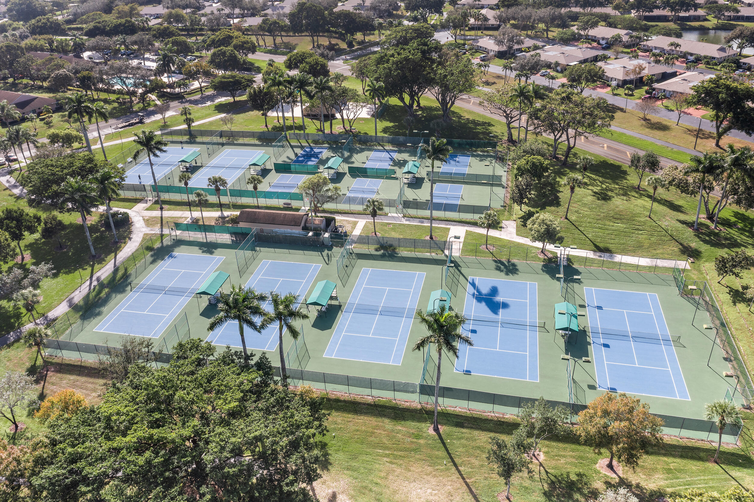 8888 Sunscape Lane Boca Raton, FL 33496 - Photo 32 of 35 an aerial view of a house with a garden