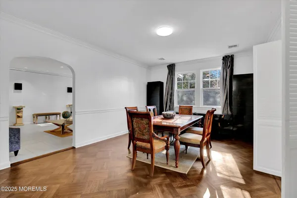 a view of a dining room with furniture