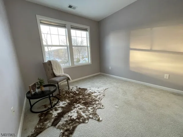 a room with furniture and window