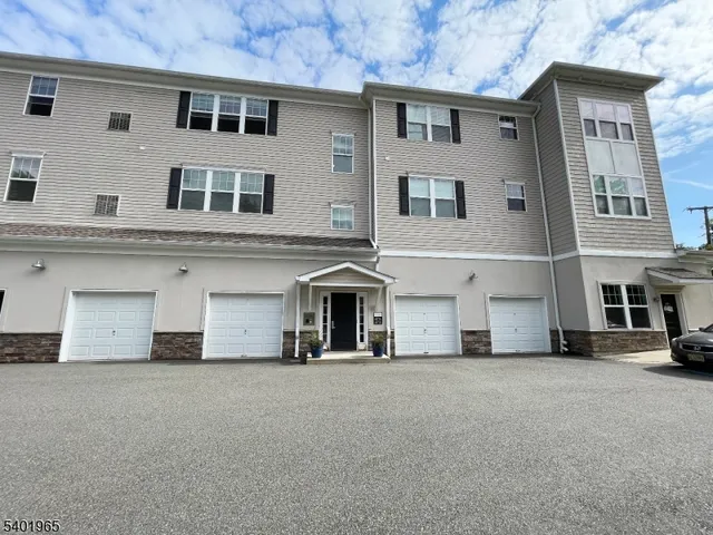 a view of a building with a street