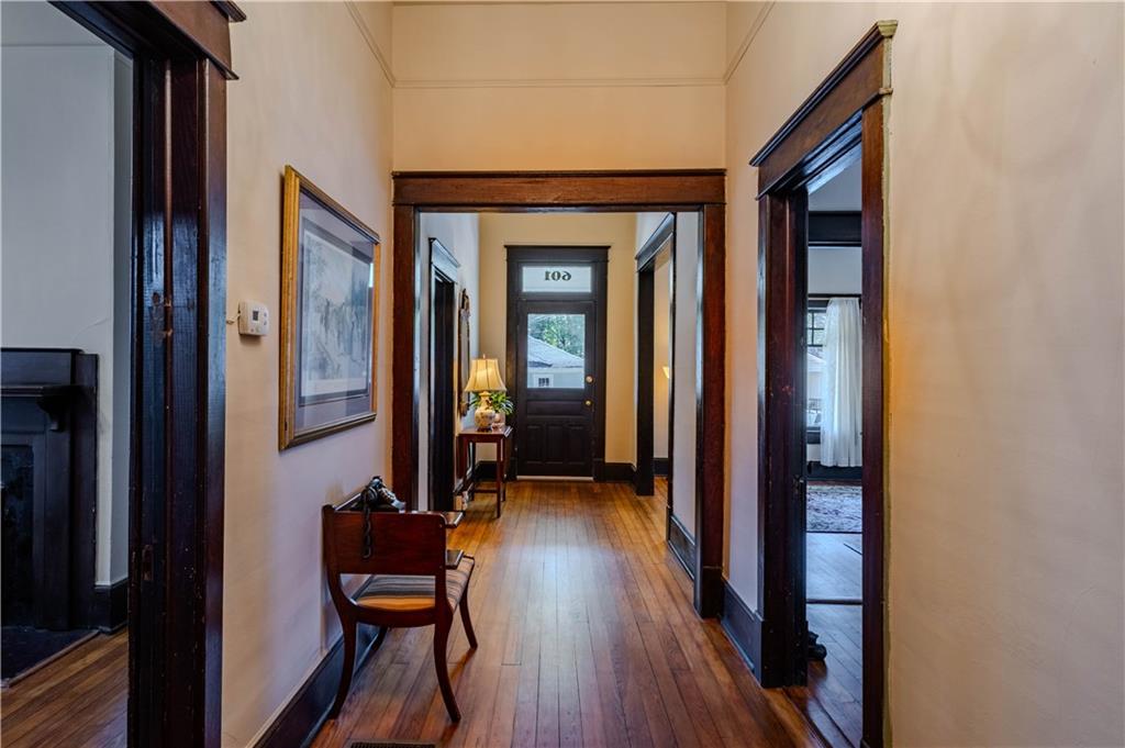 601 West 10th Street Rome, GA 30165 - Photo 12 of 25 a view of a hallway with wooden floor and furniture
