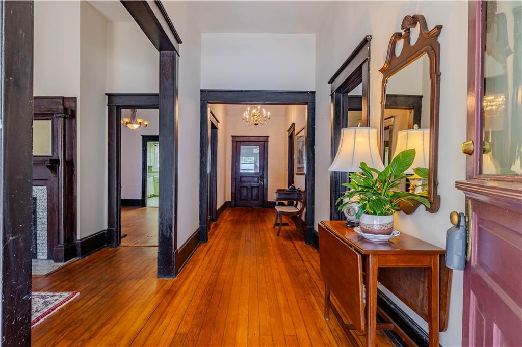 601 West 10th Street Rome, GA 30165 - Photo 13 of 25 a view of a hallway with wooden floor and furniture