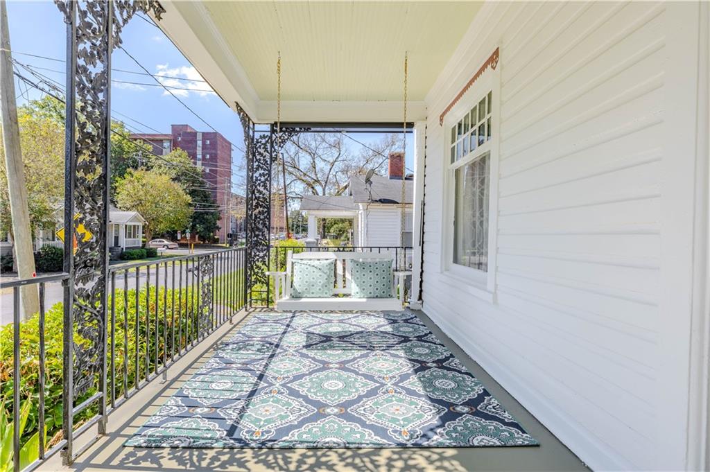 601 West 10th Street Rome, GA 30165 - Photo 25 of 25 a view of a porch with wooden floor and fence