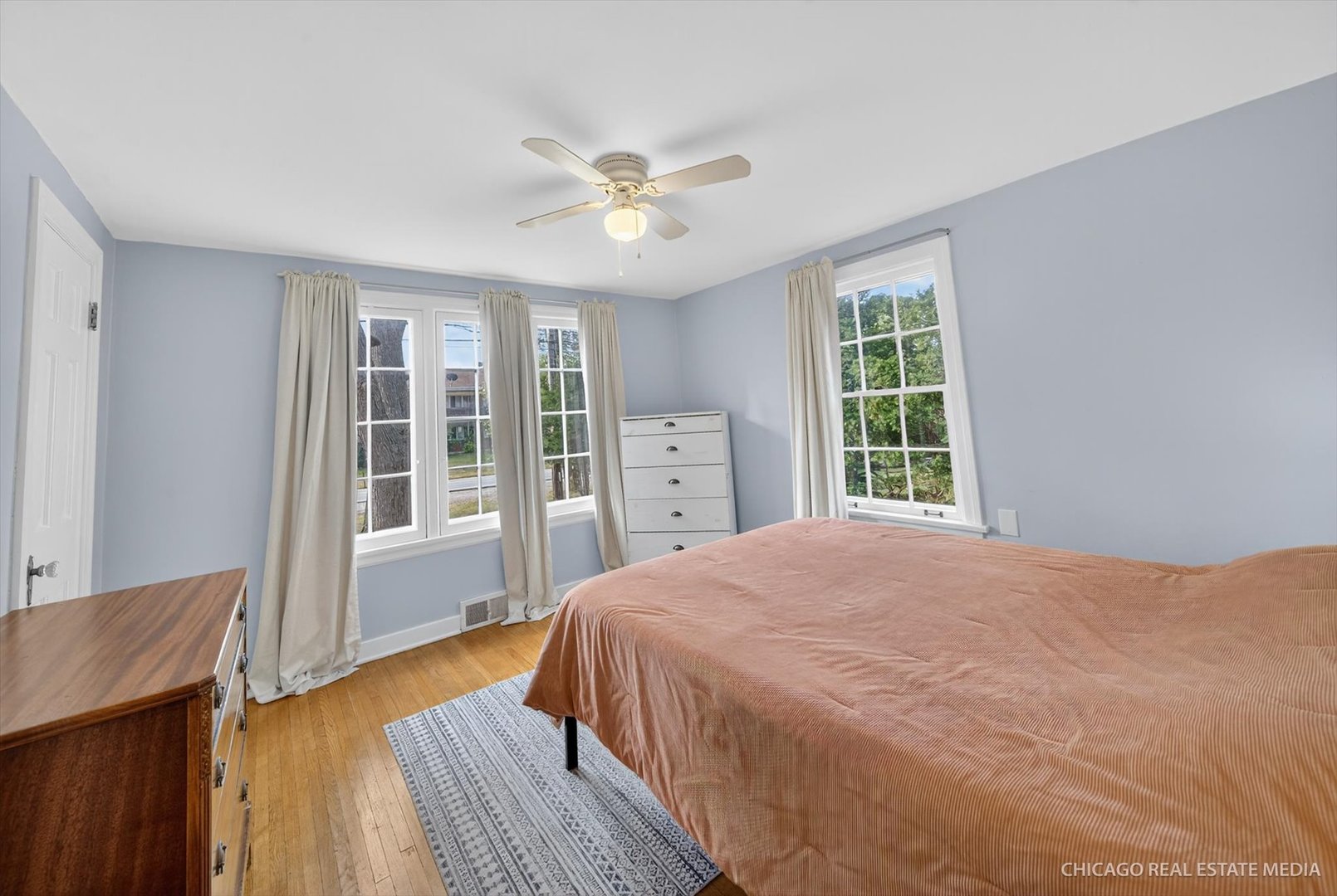 844 Bode Road Elgin, IL 60120 - Photo 13 of 34 a bedroom with a bed and wooden floor