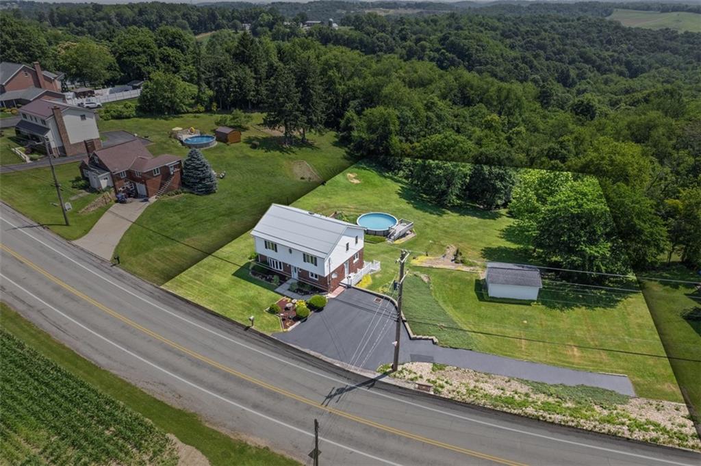 2812 Ridge Rd Extension Baden, PA 15005 - Photo 2 of 44 an aerial view of a house with garden space and street view