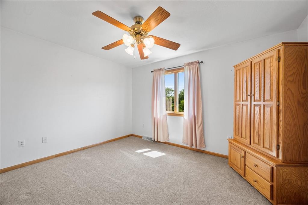 2812 Ridge Rd Extension Baden, PA 15005 - Photo 26 of 44 an empty room with windows and fan