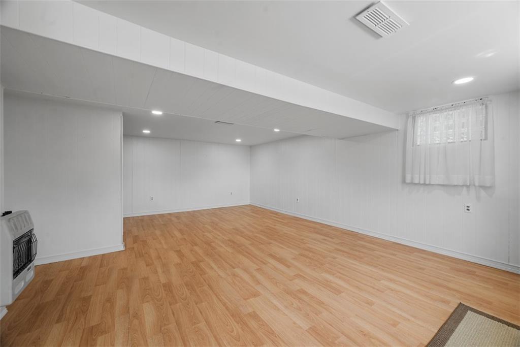 2812 Ridge Rd Extension Baden, PA 15005 - Photo 31 of 44 a view of empty room with wooden floor