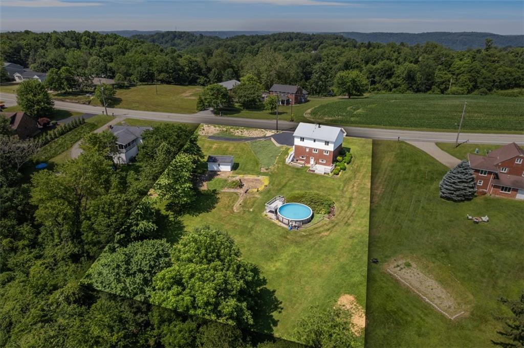 2812 Ridge Rd Extension Baden, PA 15005 - Photo 4 of 44 a view of a lake with a yard