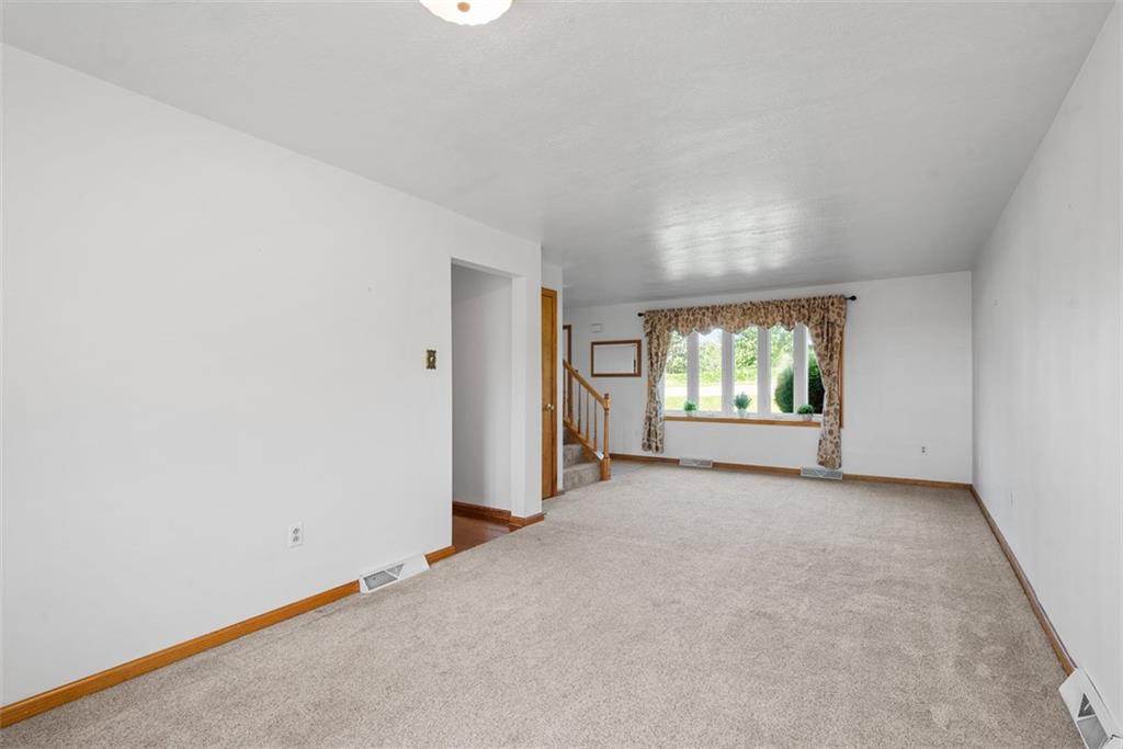 2812 Ridge Rd Extension Baden, PA 15005 - Photo 9 of 44 an empty room with windows