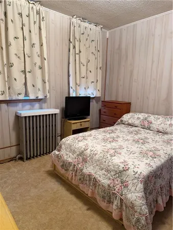 a room with furniture and a window