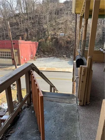 a room with table tennis and air hockey table
