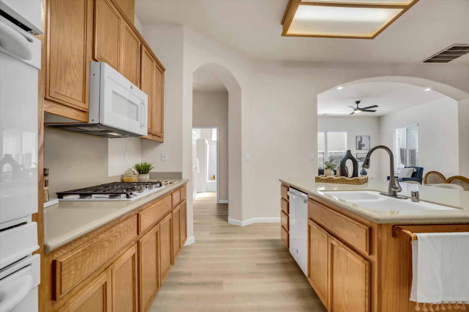 1678 Calhoun Avenue Ripon, CA 95366 - Photo 14 of 31 a kitchen with stainless steel appliances granite countertop a sink stove and cabinets