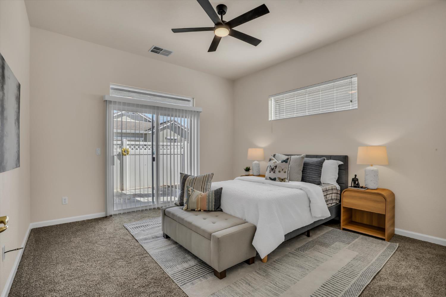 1678 Calhoun Avenue Ripon, CA 95366 - Photo 17 of 31 a spacious bedroom with a bed couch and window