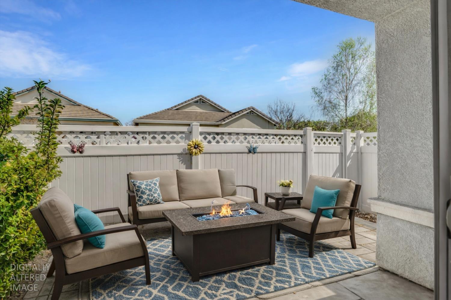 1678 Calhoun Avenue Ripon, CA 95366 - Photo 28 of 31 a view of a terrace with couches and potted plants