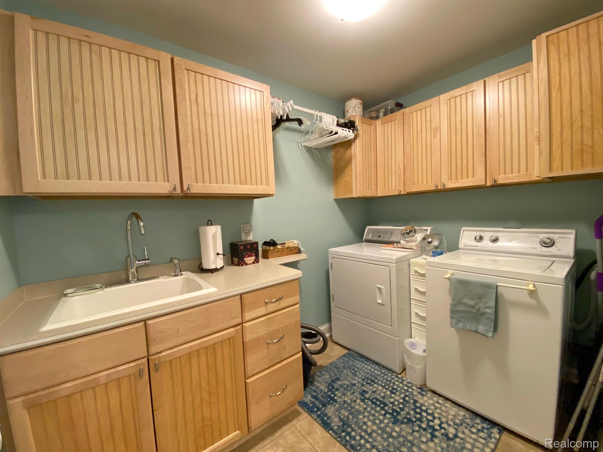 4435 Lily Drive Howell, MI 48843 - Photo 28 of 58 Laundry room