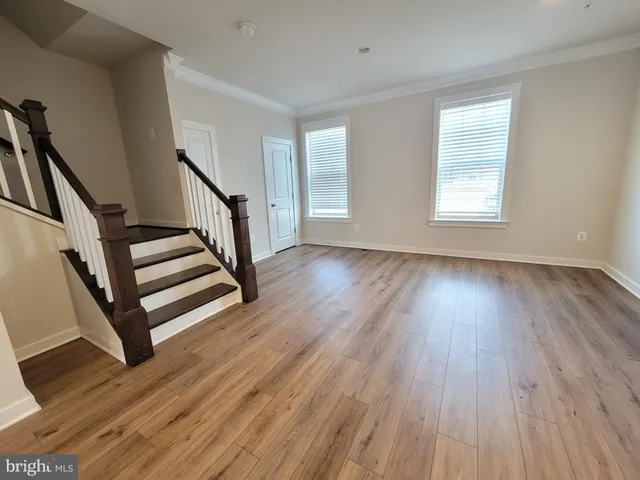 a bathroom with a toilet a sink and shower