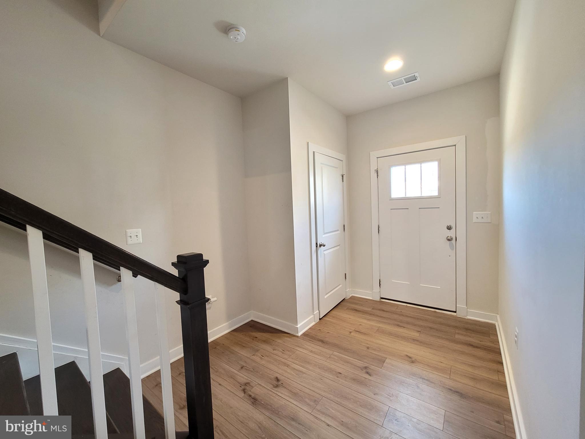8571 Red Sage Way South Frederick, MD 21704 - Photo 5 of 17 wooden floor in an empty room