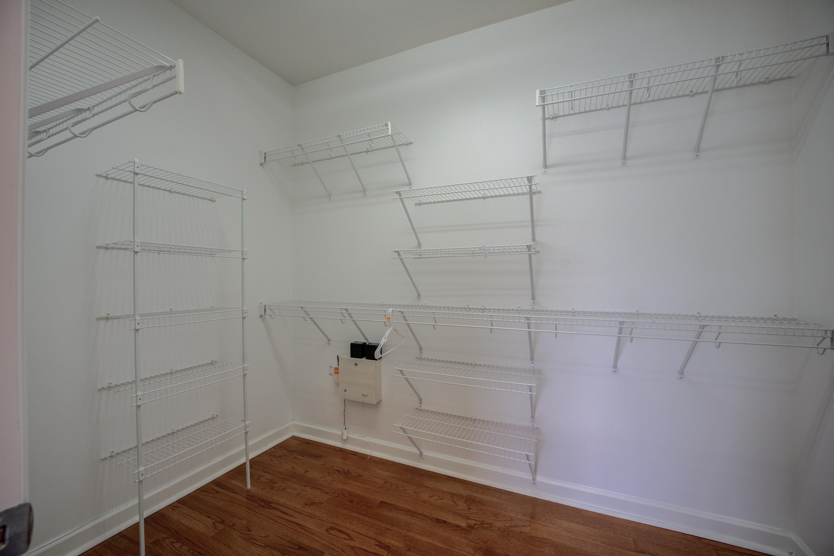 1844 Penshurst Drive Collierville, TN 38017 - Photo 23 of 40 Spacious closet featuring dark wood finished floors