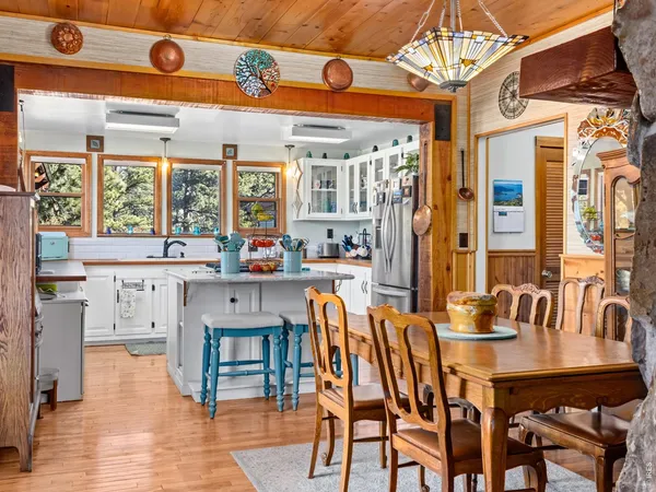 a view of a open kitchen with a white building