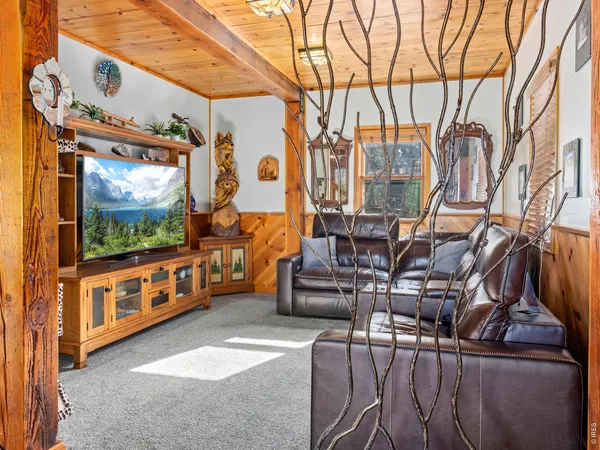 a large kitchen with a table and chairs