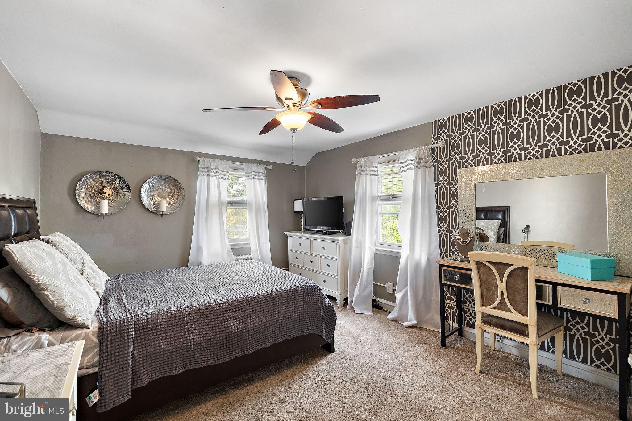 305 Troy Avenue Wilmington, DE 19804 - Photo 13 of 26 a bedroom with a bed and a table in it