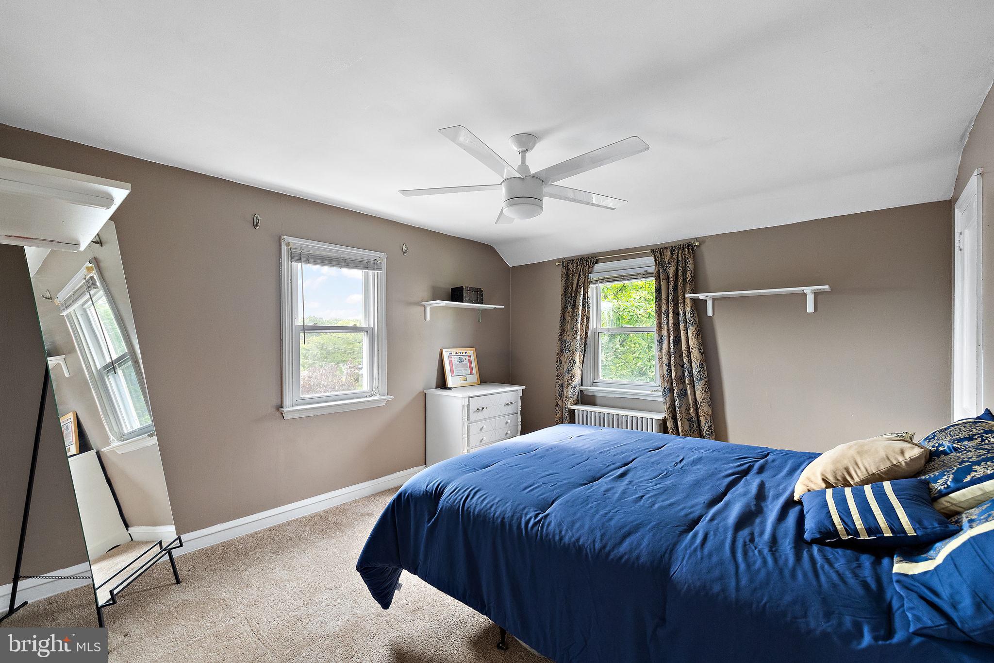 305 Troy Avenue Wilmington, DE 19804 - Photo 15 of 26 a bedroom with a bed and a window