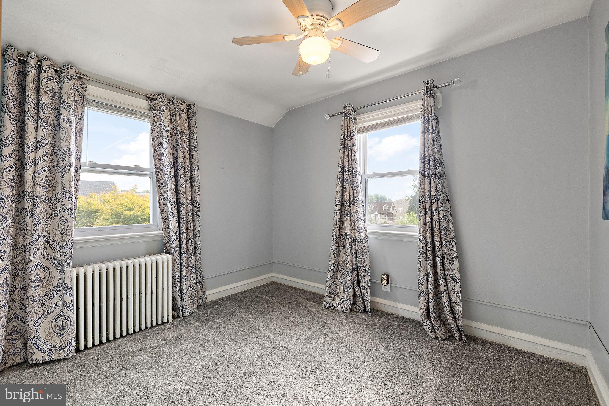 305 Troy Avenue Wilmington, DE 19804 - Photo 18 of 26 an empty room with windows and closet