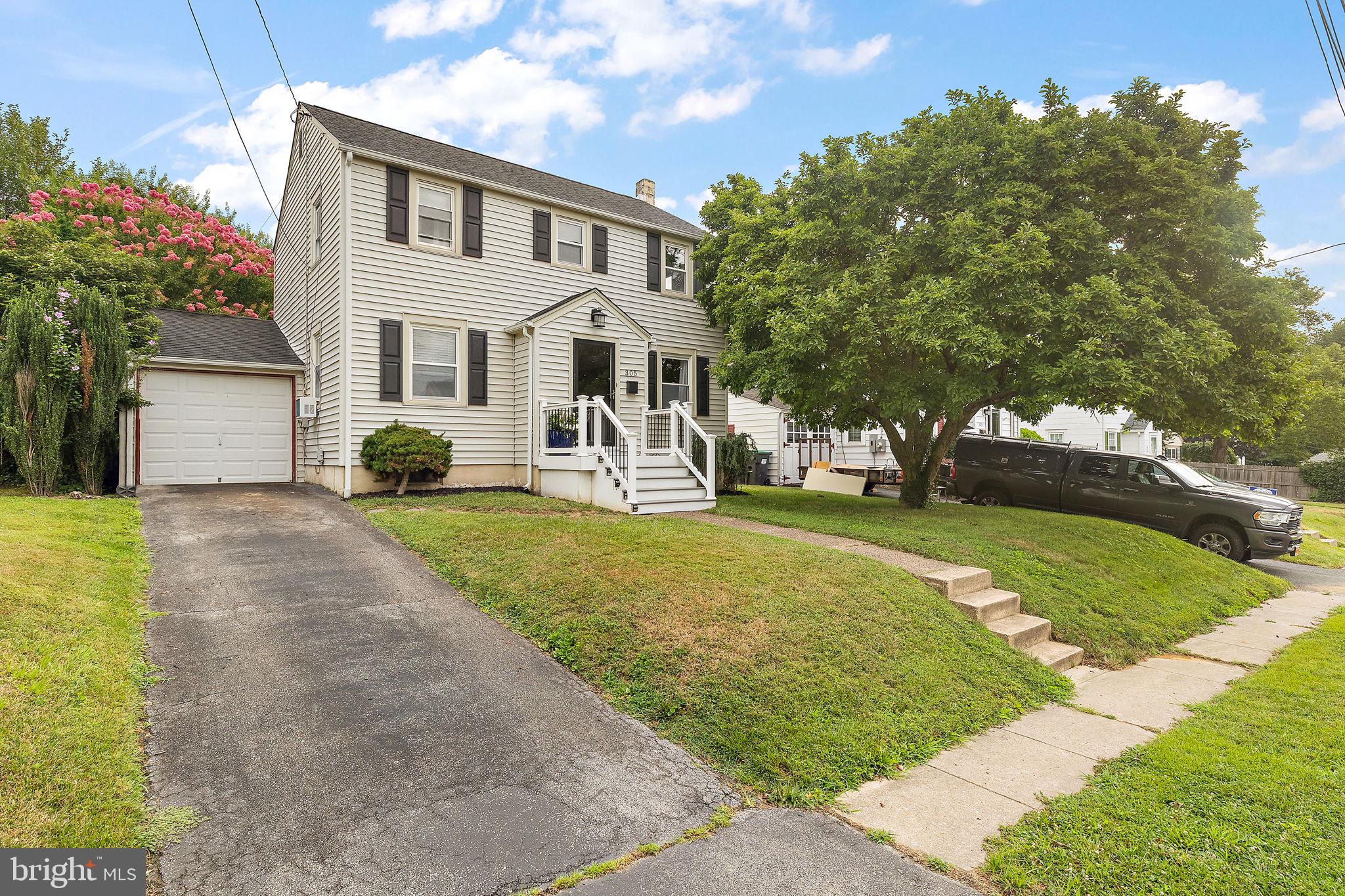 305 Troy Avenue Wilmington, DE 19804 - Photo 2 of 26 a front view of a house with a yard