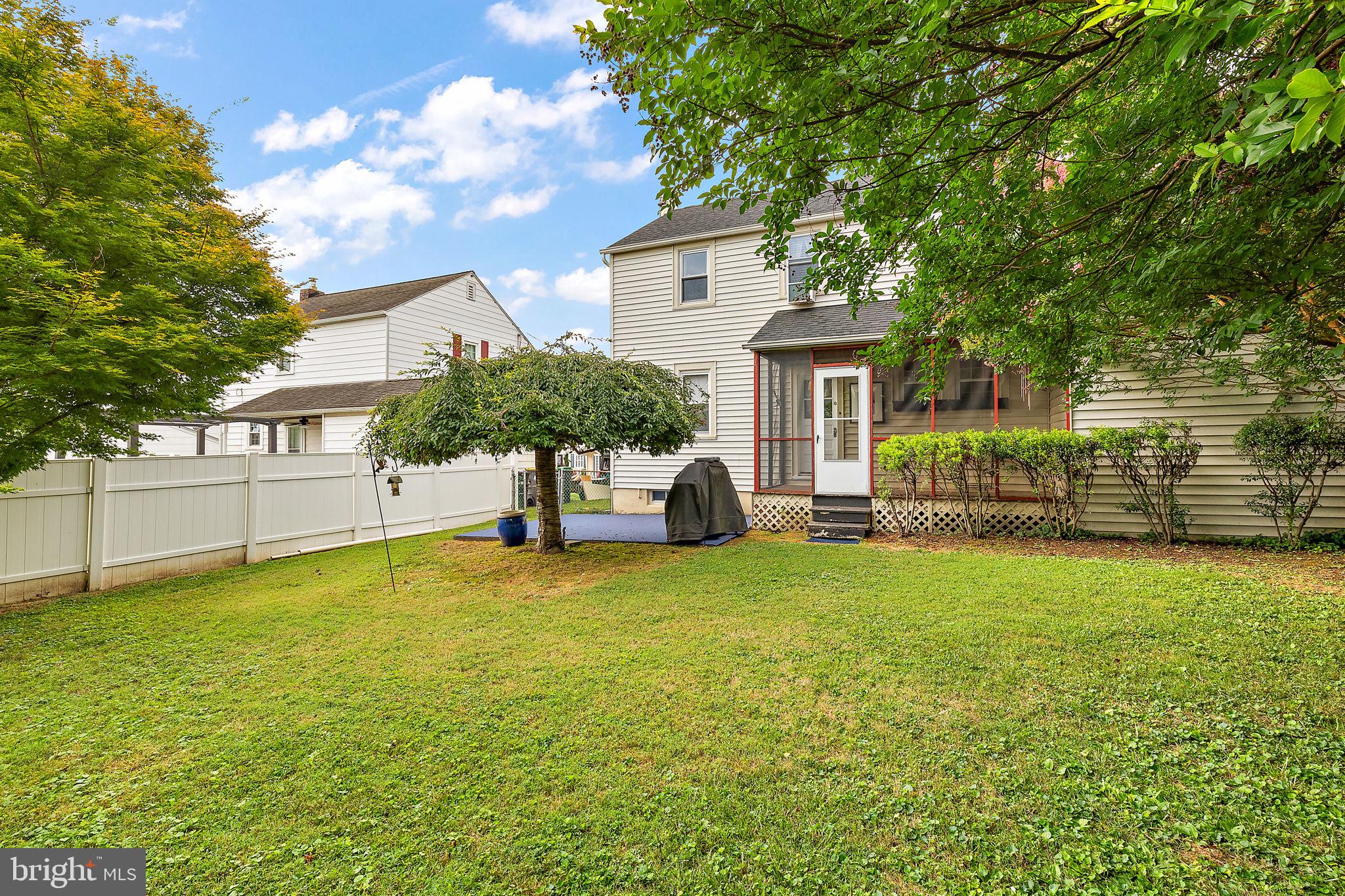 305 Troy Avenue Wilmington, DE 19804 - Photo 25 of 26 a view of a house with a yard and sitting area