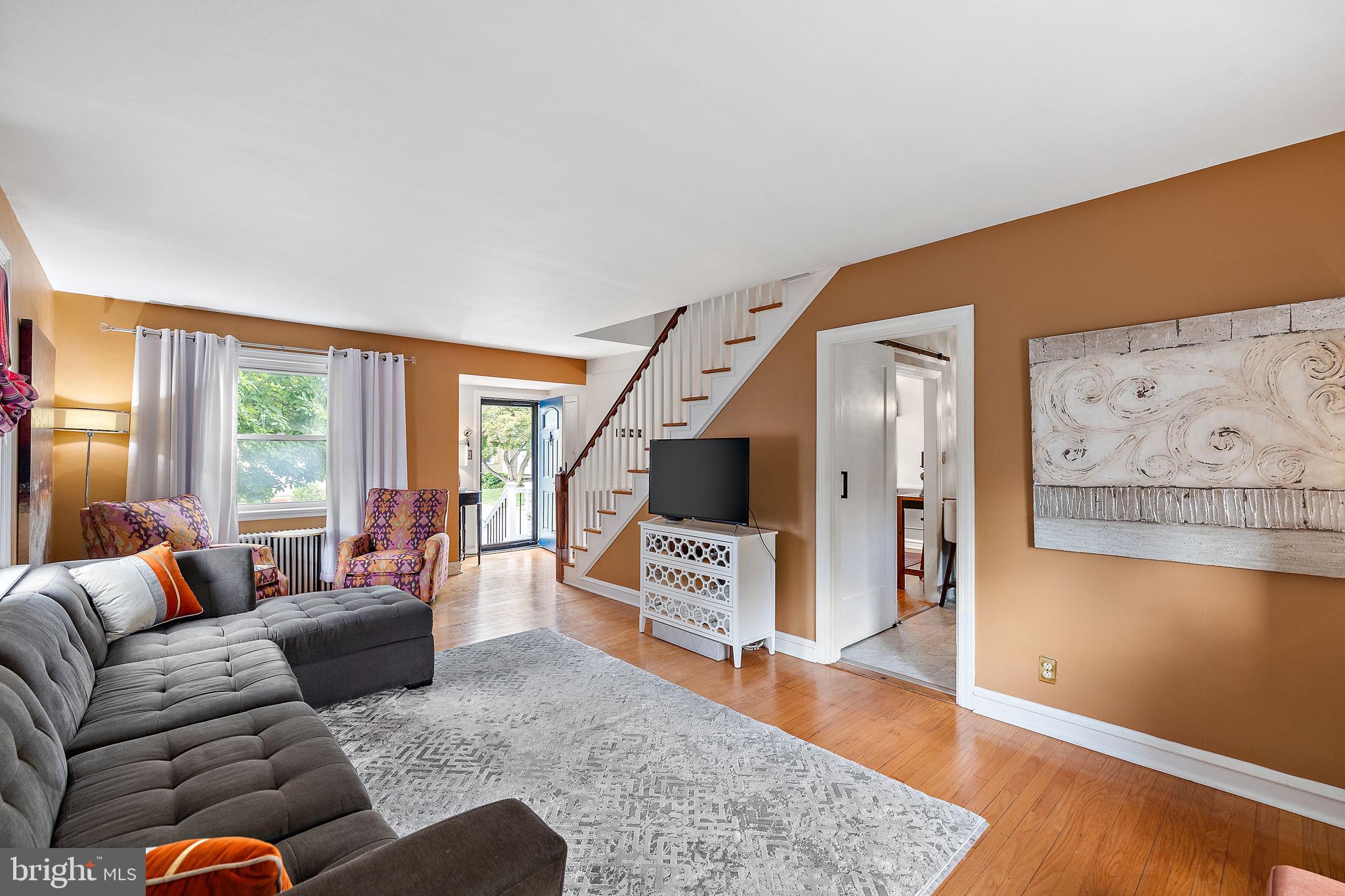 305 Troy Avenue Wilmington, DE 19804 - Photo 4 of 26 a living room with furniture and a flat screen tv