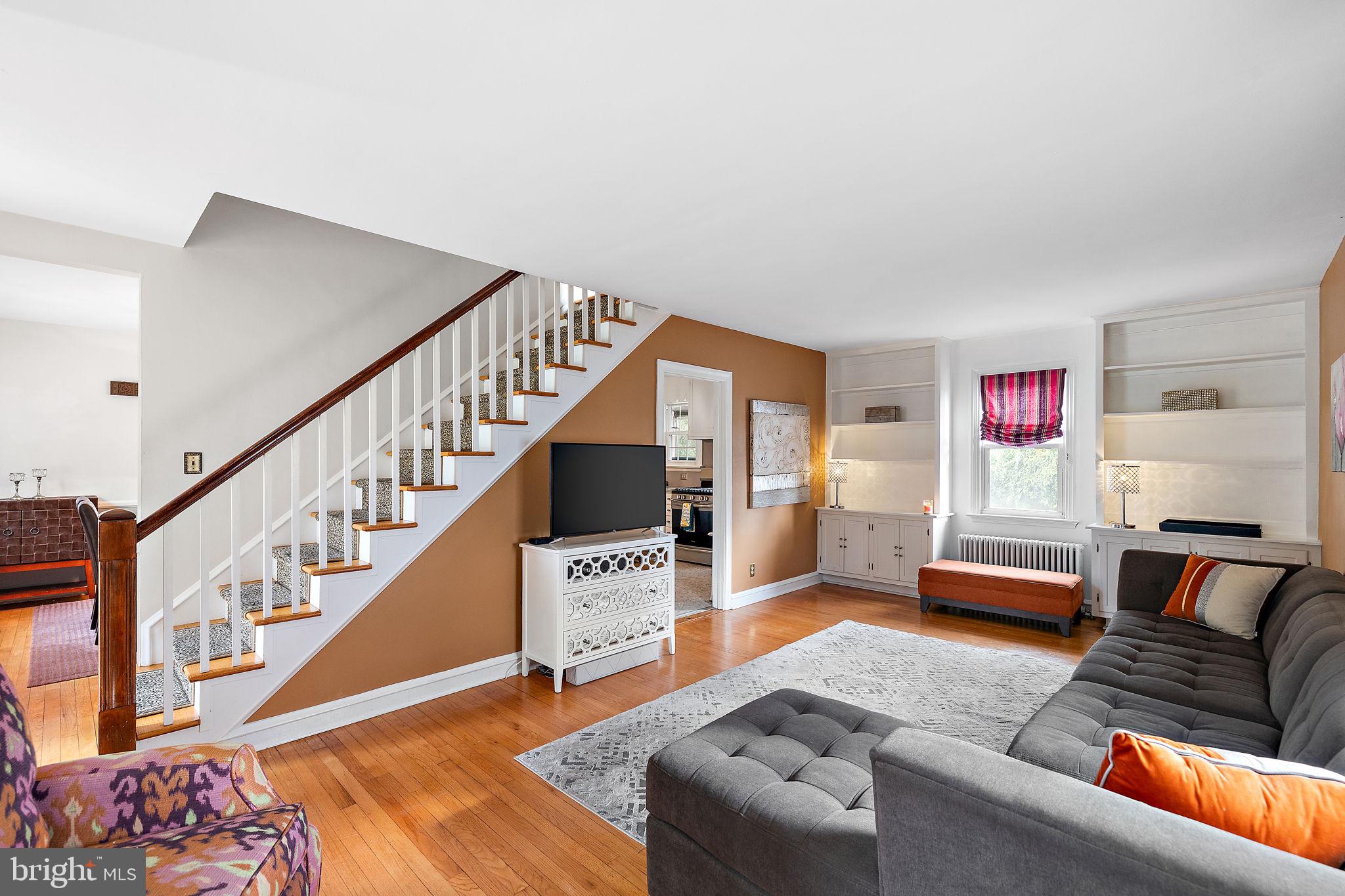 305 Troy Avenue Wilmington, DE 19804 - Photo 5 of 26 a living room with furniture and stairs