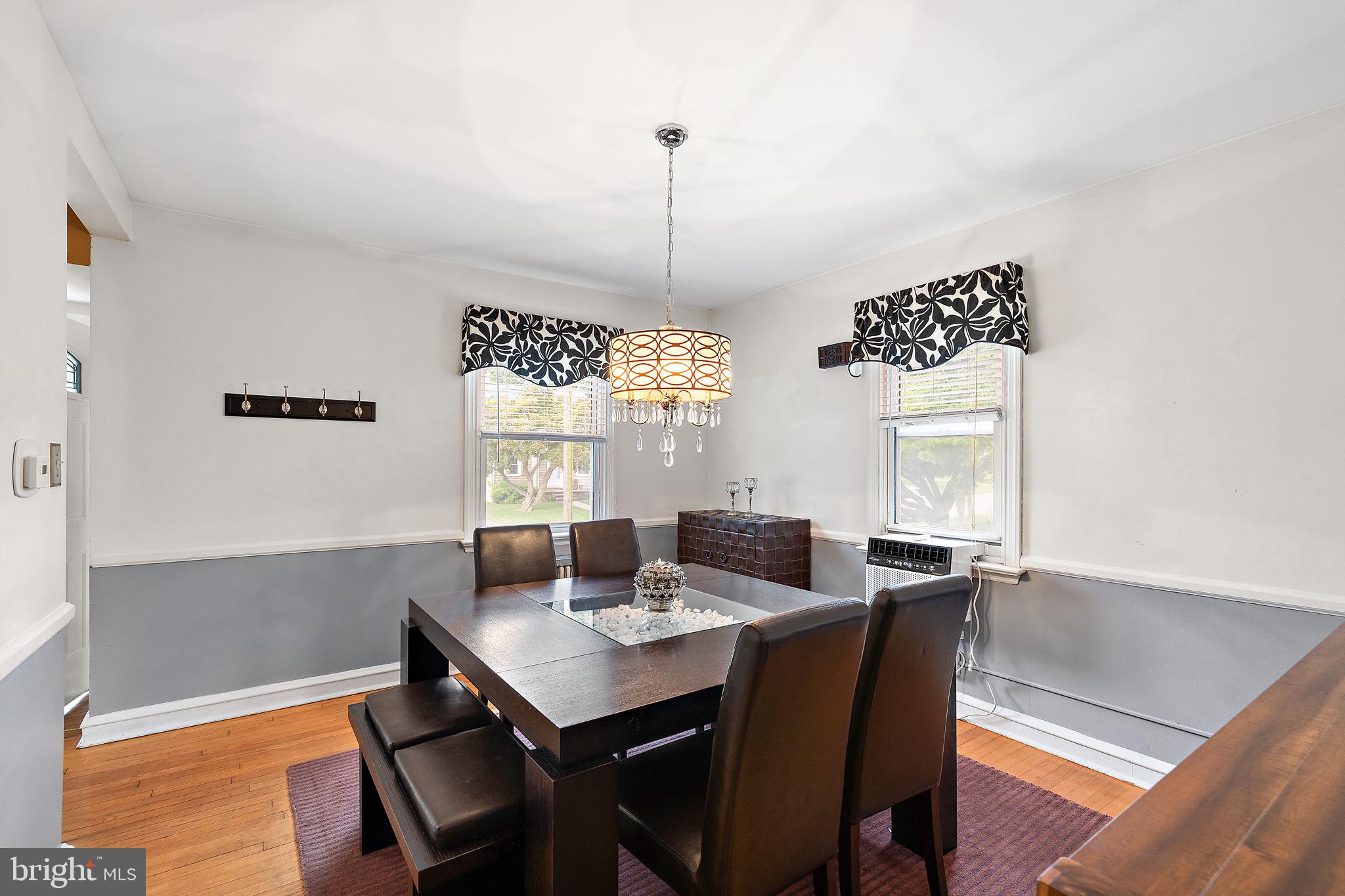 305 Troy Avenue Wilmington, DE 19804 - Photo 8 of 26 a view of a dining room with a table and chairs