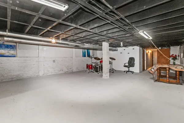 a view of a storage room with furniture
