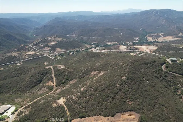 a view of a city with mountains