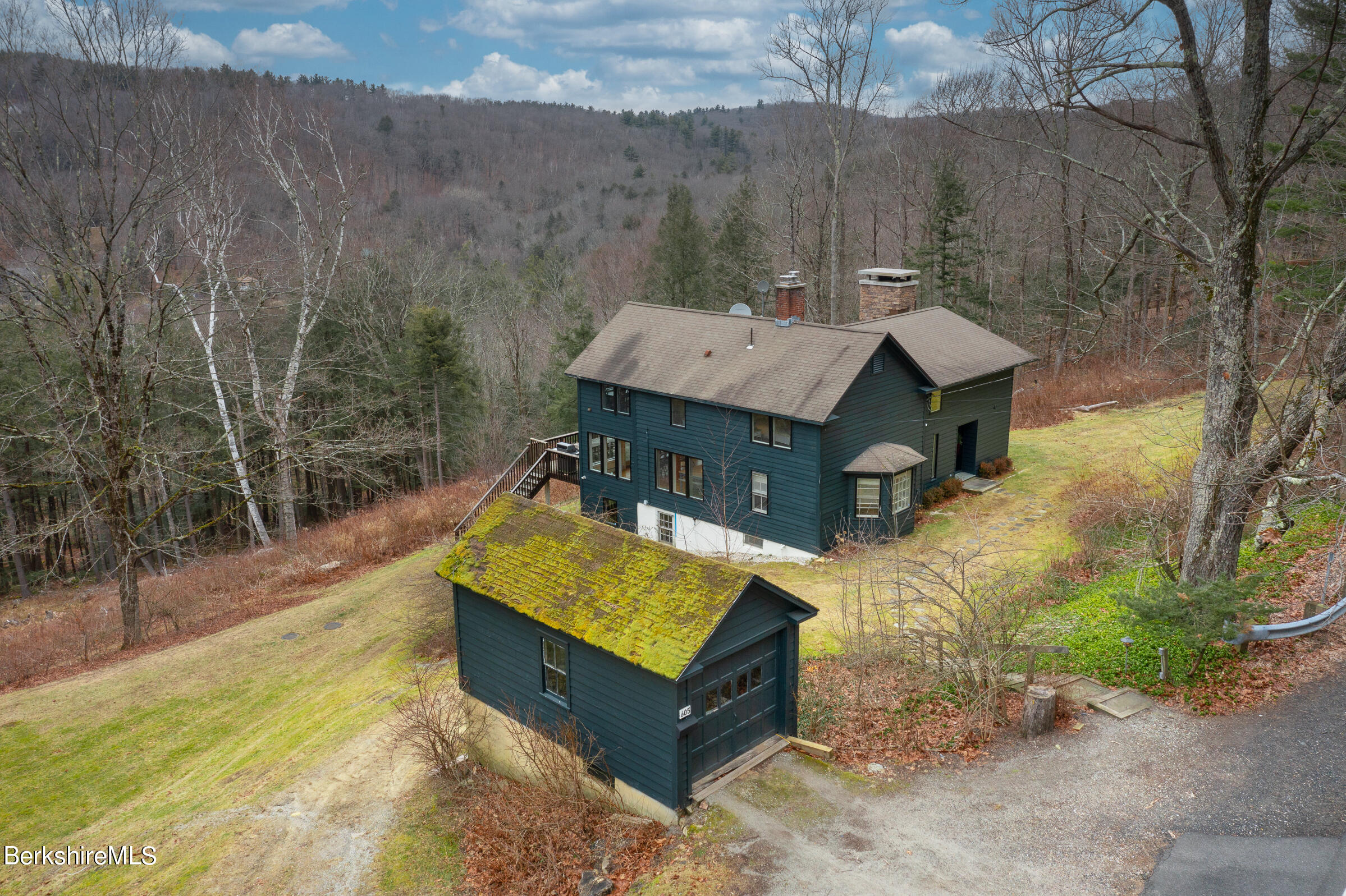 605 Main Road Monterey, MA 01245 - Photo 3 of 40 an aerial view of a house with swimming pool and porch
