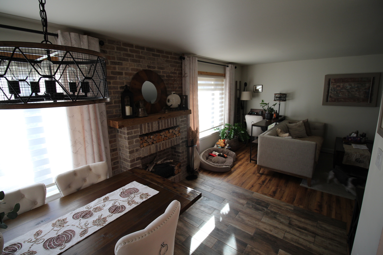 1700 Robin Lane, Unit 1D Hoffman Estates, IL 60169 - Photo 11 of 18 a living room with furniture and a fireplace