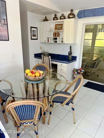 a kitchen with stainless steel appliances granite countertop a sink a refrigerator and a stove